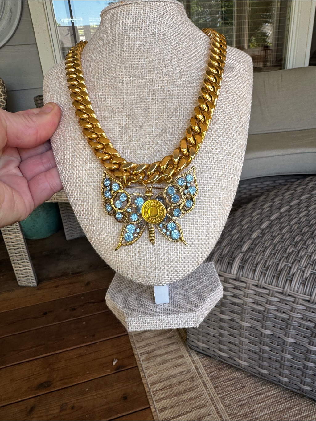 Gold-Tone Butterfly Pendant Necklace With Light Blue Crystals And Logo